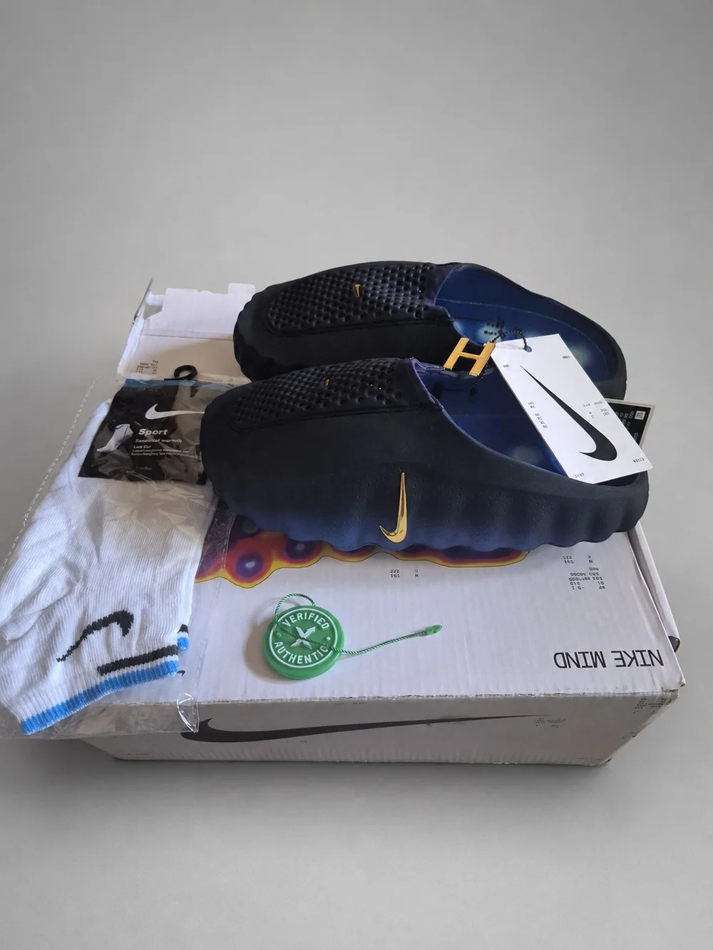 Nike Men’s Navy Foam Slip-On Sandals with Gold Swoosh